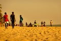 Scene of people men doing musculation sport on sand at beach during sunset in Africa, Senegal