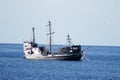 Scene of a pirate ship sailing through the blue sea in the Caribbean Royalty Free Stock Photo