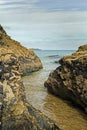 Cornish beach scene in November showing rocks and the sea Royalty Free Stock Photo