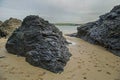 Cornish beach scene in November showing rocks and the sea Royalty Free Stock Photo