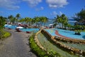 Scene of a Resort Swimming Pool Area at West Coast of Mauritius Island Royalty Free Stock Photo