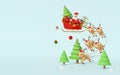 Scene of Santa Claus on a sleigh full of Christmas gifts and pulled by reindeer on a blue background Royalty Free Stock Photo