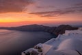 Scene of sunset overlooking the caldera and the sea in the village of Imerovigli on the island of Santorini Royalty Free Stock Photo