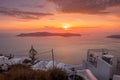 Scene of sunset overlooking the caldera and the sea in the village of Imerovigli on the island of Santorini Royalty Free Stock Photo