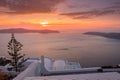 Scene of sunset overlooking the caldera and the sea in the village of Imerovigli on the island of Santorini Royalty Free Stock Photo