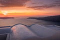 Scene of sunset overlooking the caldera and the sea in the village of Imerovigli on the island of Santorini Royalty Free Stock Photo