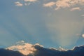 Sun hidden behind the cloud at sunset Royalty Free Stock Photo