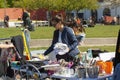 Scene from weekend flea market. Shopping objects at flea market is a popular hobby. Stock Image.