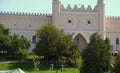 Scene of the white Lublin Castle with a beautiful yard in the daytime in Lublin, Poland