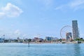 Scenery of Batumi Seaport and Beach of the Black Sea with Red Ferris Wheel Royalty Free Stock Photo