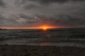 Scenery of a beach with a cloudy sky and sunset in the afternoon Royalty Free Stock Photo