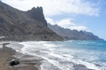 Scenery beach with volcano sand and majestic cliff in Anaga. Playa de Las Bodegas, Tenerife, Canary Islands