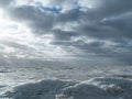 Scenery of a beautiful cloudy sky over an ice-covered pond Royalty Free Stock Photo