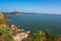 The scenery is beautiful rocky coast, blue sea and cloudless sky. Om beach, Gokarna, Karnataka, India Royalty Free Stock Photo