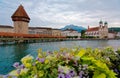 Scenery of Chapel Bridge Kapellbrucke over Reuss River in Lucern, Switzerland, with Water Towe Royalty Free Stock Photo