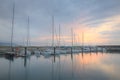 Scenery of fishing boats and yachts parking in marina under stormy sky in I-lan, Taiwan Royalty Free Stock Photo