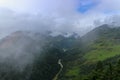 Scenery of foggy hills and Mangde River in Bumthang, Bhutan