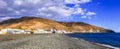 Scenery of Fuerteventura island -traditional fishing village and beach with black sand Royalty Free Stock Photo