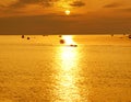 Scenery golden sky, seascape at sunrise period and reflex sunlight on wave. Royalty Free Stock Photo
