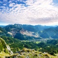 Scenery of high mountain with high peaks and dramatic clouds