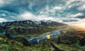 Scenery of hiker standing on top of Valahnukur viewpoint among the mountain and river in Icelandic Highlands