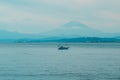 Scenery Kamakura Yuigahama Beach with Kamakura city and Fujisan mountain. Mount Fuji behind Enoshima island at Kamakura, Kanagawa Royalty Free Stock Photo