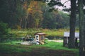 Scenery of a lake and a house overlooking the lake