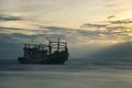 The scenery of the long-exposure of the shipwreck in sunset time at Samui island, Surat Thani province, Thailand