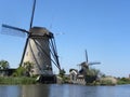 Scenery of a mill on a blue clear sky background Royalty Free Stock Photo