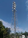A scenery of a mobile tower with the blue sky Royalty Free Stock Photo