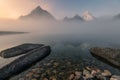 Scenery of mount Assiniboine in foggy on Magog lake at the morning Royalty Free Stock Photo