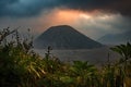 The scenery of Mount Batok in a hazy look in sunset time at Java island, Indonesia