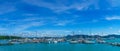 Scenery panorama of Phuket Yacht Haven Marina in Thailand, Sailboat catamarans and luxury yachts berthing in yacht pier, Waiting