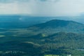 Scenery panoramic landscape of mountain range and cloudy blue sky, aerial view from rainforest mountain peak of Gunung Panti