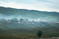 Scenery of pastoral village in morning foggy and smog