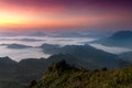 The scenery of Phu Chi Dao that plenty of sea of mist and twilight sky above before sunrise in Chiang Rai province, Thailand Royalty Free Stock Photo