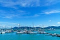 Scenery of Phuket Yacht Haven Marina in Thailand, Sailboat catamarans and luxury yachts berthing in yacht pier, Waiting for