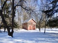 Scenery of a Red Barn and Snow