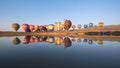 The scenery of reflection of balloons over the lake in Chiang Rai, Thailand