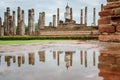 The scenery of the reflection of the buddha statue inside Wat Mahathat temple in Sukhothai historical park at Sukhothai province,