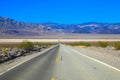 Scenery route through Death Valley National Park, lonesome road in the deser. Tourism and vacations concept, California United Sta Royalty Free Stock Photo