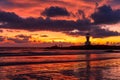 The scenery of the silhouette of Khao Lak Light Beacon in sunset time with the dramatic twilight sky at Nang Thong Beach, Phang