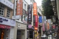 Scenery of street traffic in Taipei with difference dvertisement billboards of shops and stores along the road Royalty Free Stock Photo