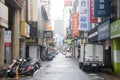 Scenery of street traffic in Taipei with difference dvertisement billboards of shops and stores along the road Royalty Free Stock Photo