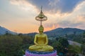 Scenery sunset behind the golden buddha in Chiang Rai Royalty Free Stock Photo