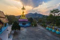 Scenery sunset behind the golden buddha in Chiang Rai Royalty Free Stock Photo