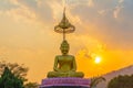 Scenery sunset behind the golden buddha in Chiang Rai Royalty Free Stock Photo