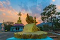 Scenery sunset behind the golden buddha in Chiang Rai