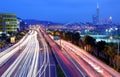 Scenery of the Taipei city, Xin-Yi District and downtown area with the MacArthur Bridge and car trials on Avenue