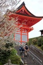 Scenery of tourists climbing the stairway to majestic Kiyomizu Dera, a famous Buddhist Temple in Kyoto Royalty Free Stock Photo